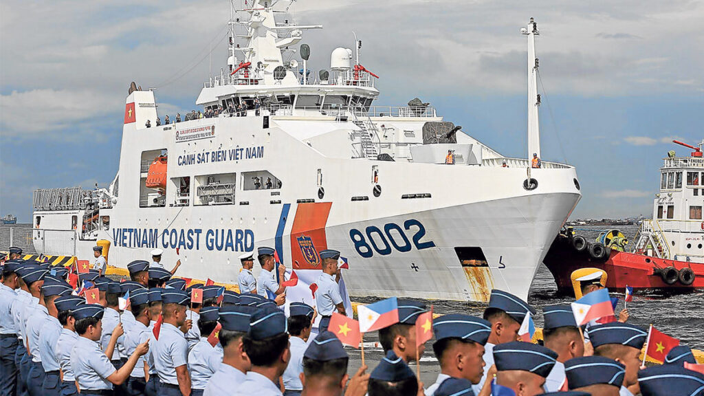 PORT CALL Members of the Philippine Coast Guard onMonday welcome Vietnam Coast Guard CSB 8002 and its crew at South Harbor in Manila for a five-day port call. The coast guards of the two countries will hold joint exercises for search and rescue, and fire and explosion prevention training. —RICHARD A. REYES