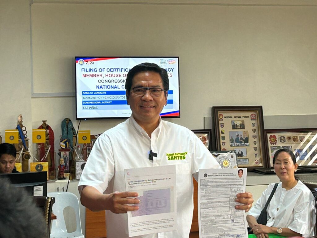 Las Piñas Councilor Mark Anthony Santos files his COC seeking to secure a seat in the lower chamber as the city's lone district representative. Santos is the first COC filer at the Comelec-NCR office in San Juan City on Sunday, Oct. 6, 2024. | PHOTO: Faith Argosino / INQUIRER.net