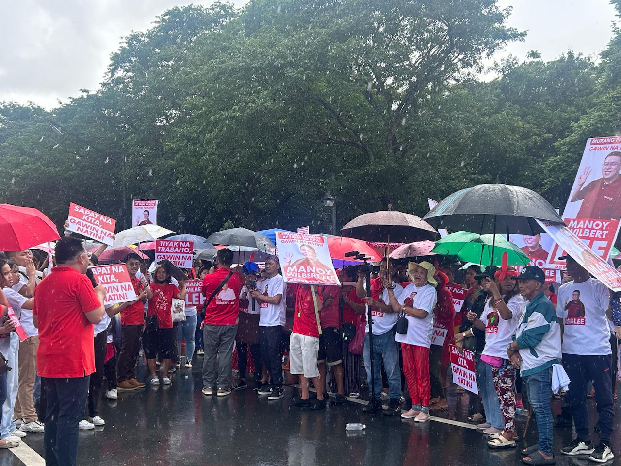 The rain does not stop the supporters of Agri Party-list Wilbert Lee in expressing their support for the incumbent congressman who just filed his certificate of candidacy for senator on Tuesday, October 1, 2024.