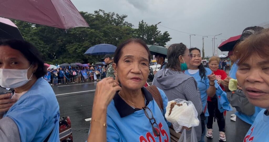 Zennie Bibiano, elderly supporter of senatorial aspirant Benhur Abalos at the Manila Hotel Tent City (Photo from CHARIE ABARCA / INQUIRER.net)