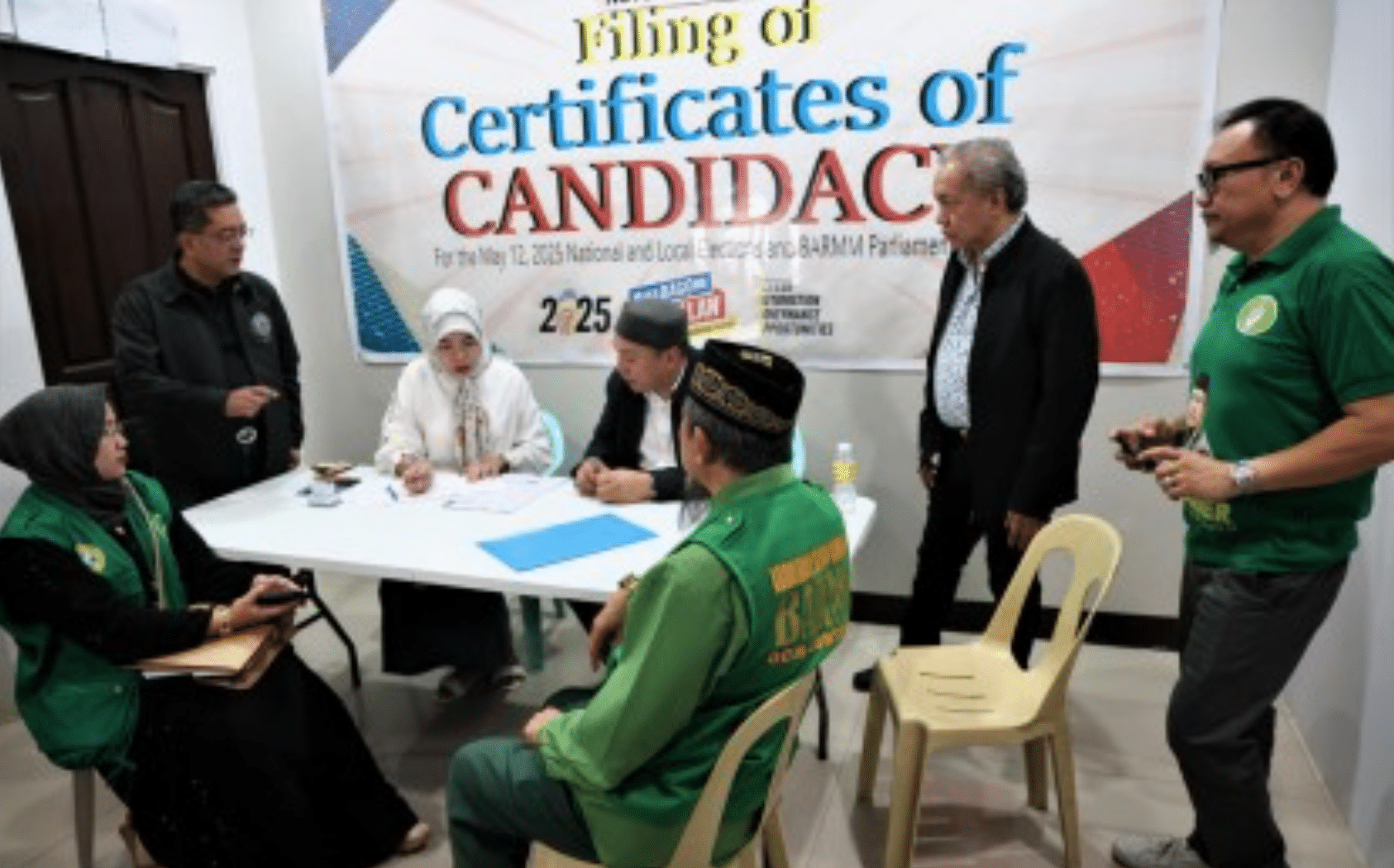 COC FILING. Commission on Elections (Comelec) Chair George Erwin Garcia (extreme left, standing) supervises the conduct of the first day of the filing of Certificates of Candidacy for the May 12, 2025 BARMM Parliamentary Elections (BPE) at the Bangsamoro Electoral Office, Cotabato City and Camp Siongco, Maguindanao del Norte on Nov. 4, 2024. A total of 109 aspirants filed their COCs for parliamentary district representatives during the filing period from Nov. 6-9. (Comelec photo)